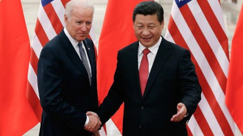 拜登和习近平会见的资料照片。(路透社)