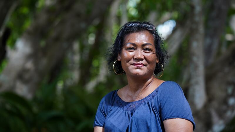 Nest Mechaet, a state legislator for Elab hamlet, sits at her family’s traditional land in Ngaraard state, Palau, Nov. 30, 2024.