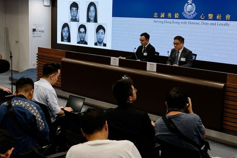 2023年12月14日,香港警务处国家安全处再以一百万元悬红通缉五名在海外的港人。(路透社)