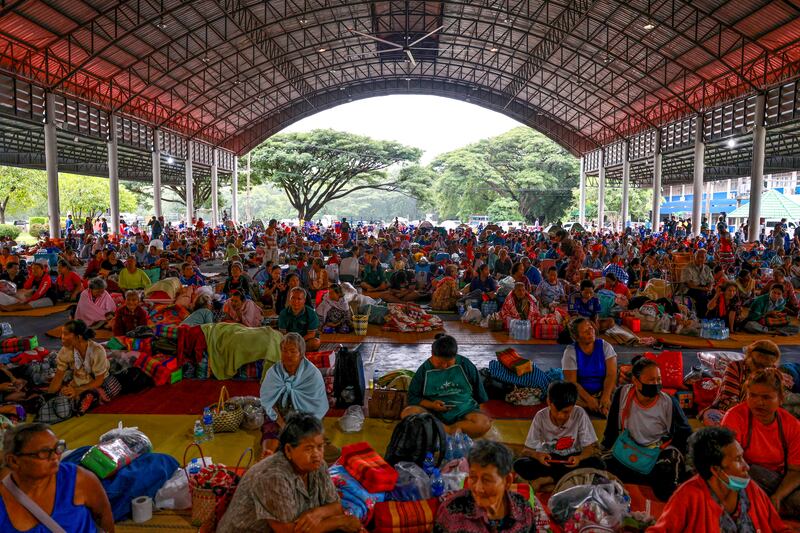 People rest inside a temporary shelter in Sisaket province, Thailand, July 26, 2025.