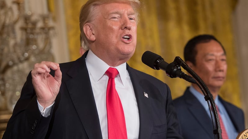 图说:富士康投资百亿美金 郭台铭台企入白宫第一人。(法新社)