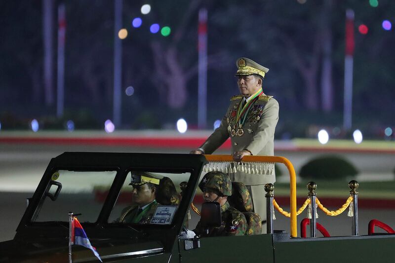 Myanmar junta chief Senior Gen. Min Aung Hlaing inspects soldiers during a parade to commemorate Myanmar's 79th Armed Forces Day, in Naypyidaw, March 27, 2024. (Aung Shine Oo/AP)