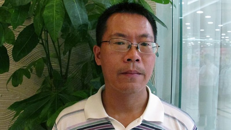 身在美国的中国人权律师滕彪(美联社)