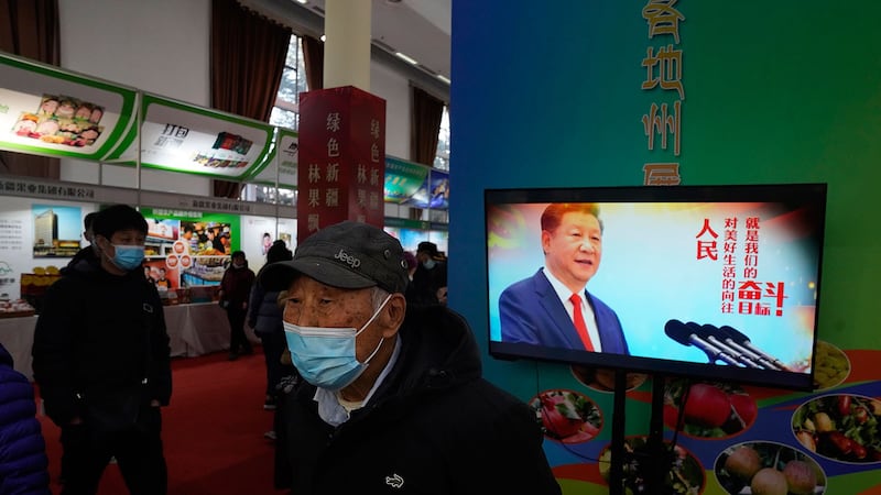 农产品北京博览会上,展示中国国家主席习近平宣传标语。