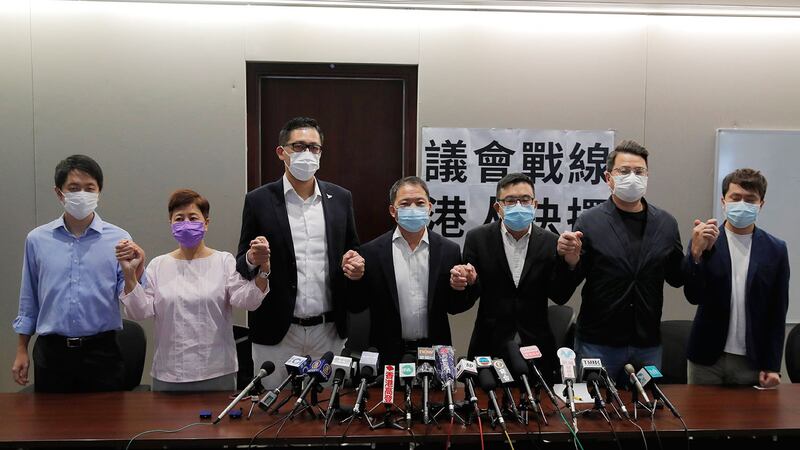 2020年8月20日,香港民主党议员林卓延,胡志伟,涂谨申,尹兆坚等出席新闻发布会。(AP)