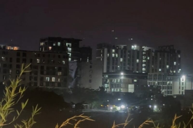 Despite electricity cuts by Thailand, lights shine in Shwe Kokko New Town in Myanmar on Feb. 5, 2025, after residents turned on generators.